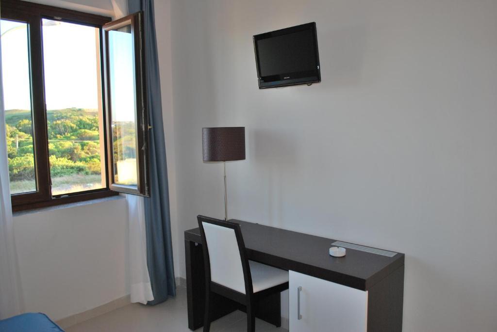 Buddi Hotel Platamona Habitación foto