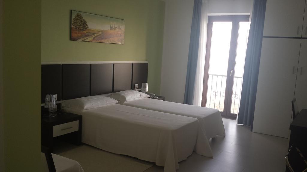 Buddi Hotel Platamona Habitación foto