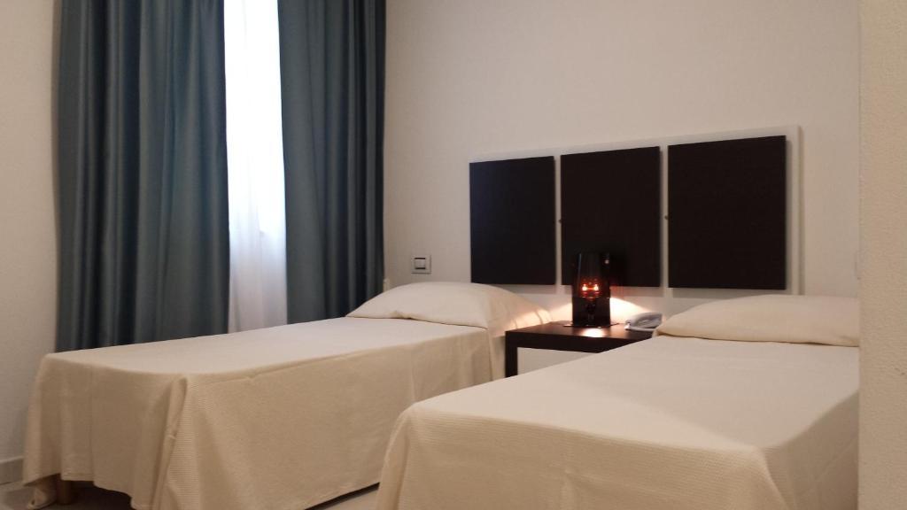 Buddi Hotel Platamona Habitación foto